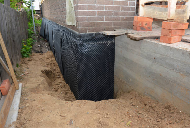 Happy homeowners after waterproofing job in Cliffwood